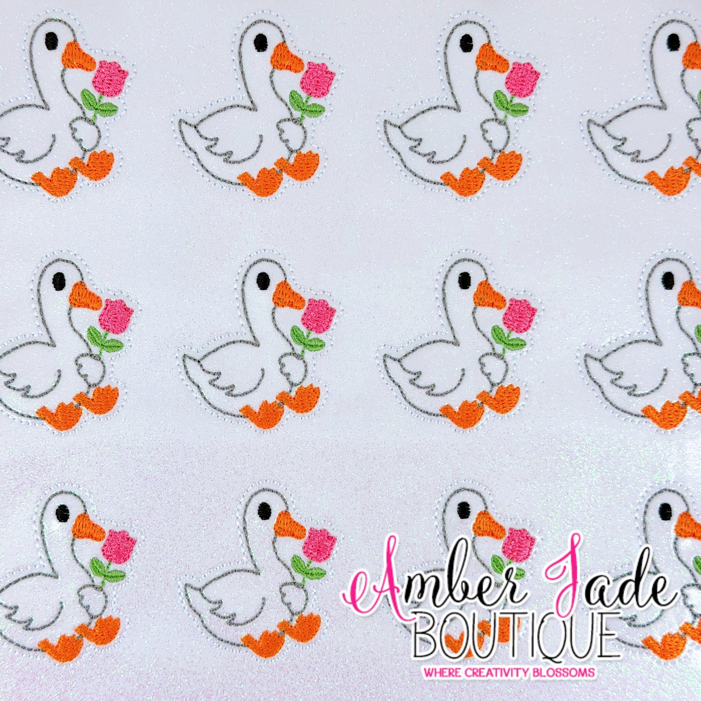 Goose Holding Pink Flower